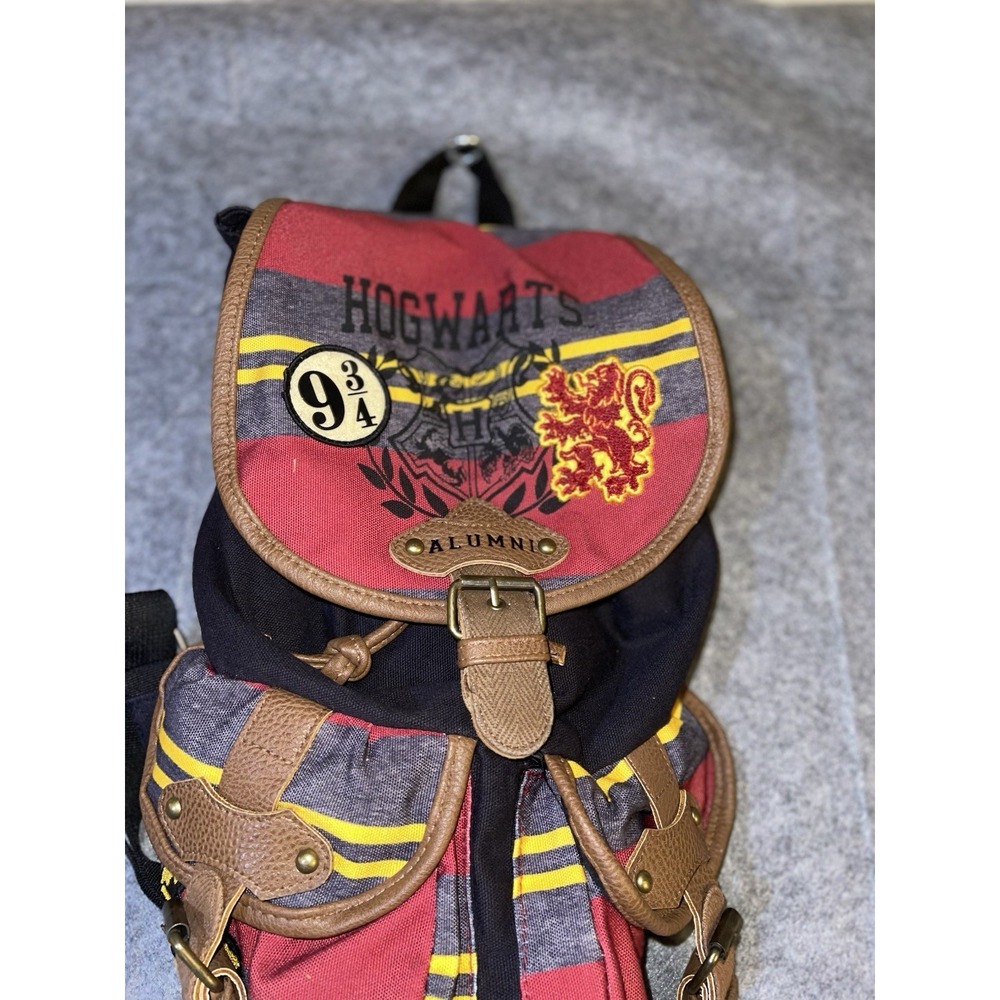Harry Potter Hogwarts Alumni Gryffindor Sling Backpack Red Gold Striped Canvas